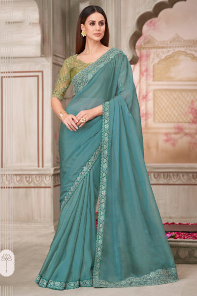 Georgette Silk Lace Border Work Saree In Cyan Color