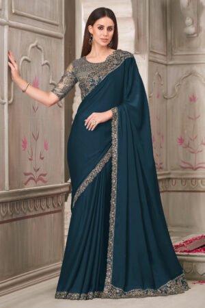 Teal Georgette Silk Lace Border Work Saree With Embroidered Blouse